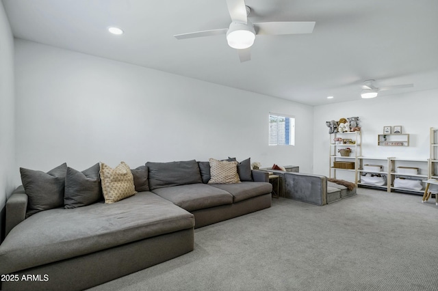 living room with recessed lighting, ceiling fan, and carpet