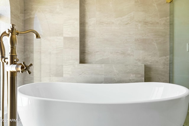 full bath featuring a soaking tub