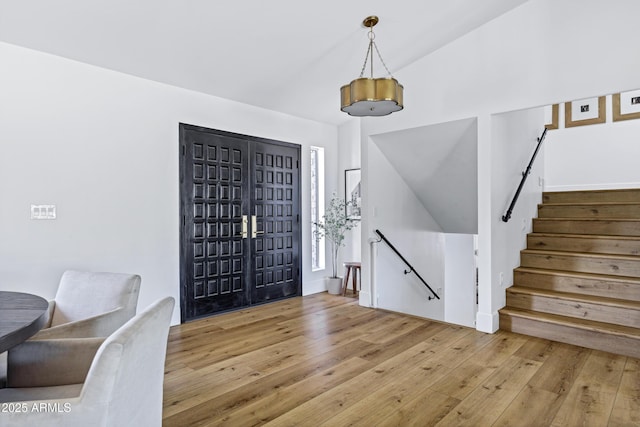 foyer entrance with hardwood / wood-style floors
