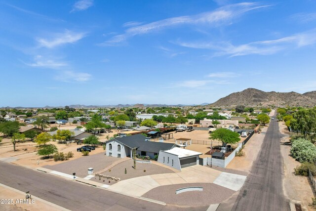 bird's eye view featuring a mountain view and a residential view
