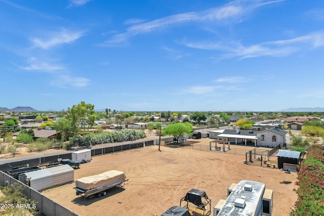 birds eye view of property featuring a mountain view and a residential view