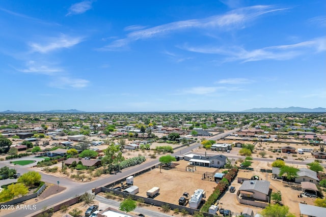 drone / aerial view with a residential view and a mountain view