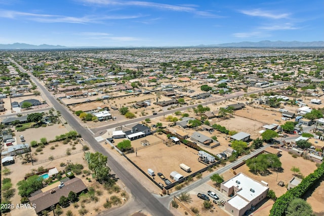 drone / aerial view featuring a mountain view