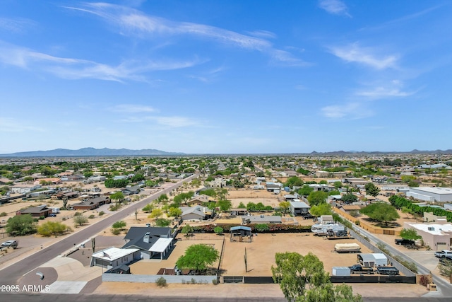 birds eye view of property featuring a mountain view and a residential view