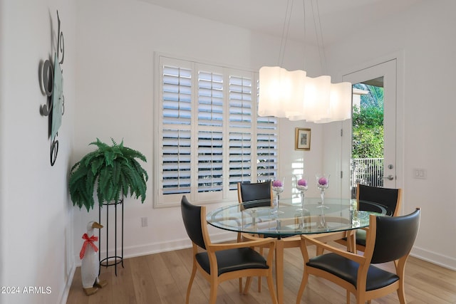 dining room with light wood-type flooring