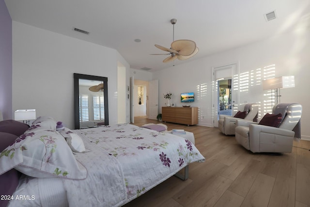 bedroom with wood-type flooring and ceiling fan