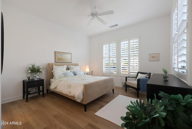 bedroom featuring ceiling fan and wood-type flooring