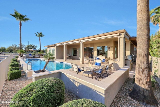 view of pool featuring a patio area