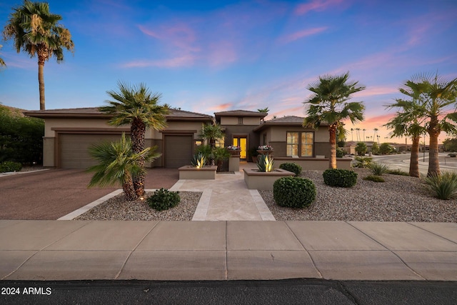 view of front of property featuring a garage