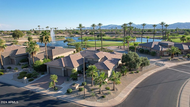 aerial view with a water and mountain view