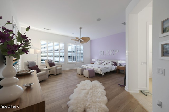 bedroom with light hardwood / wood-style floors