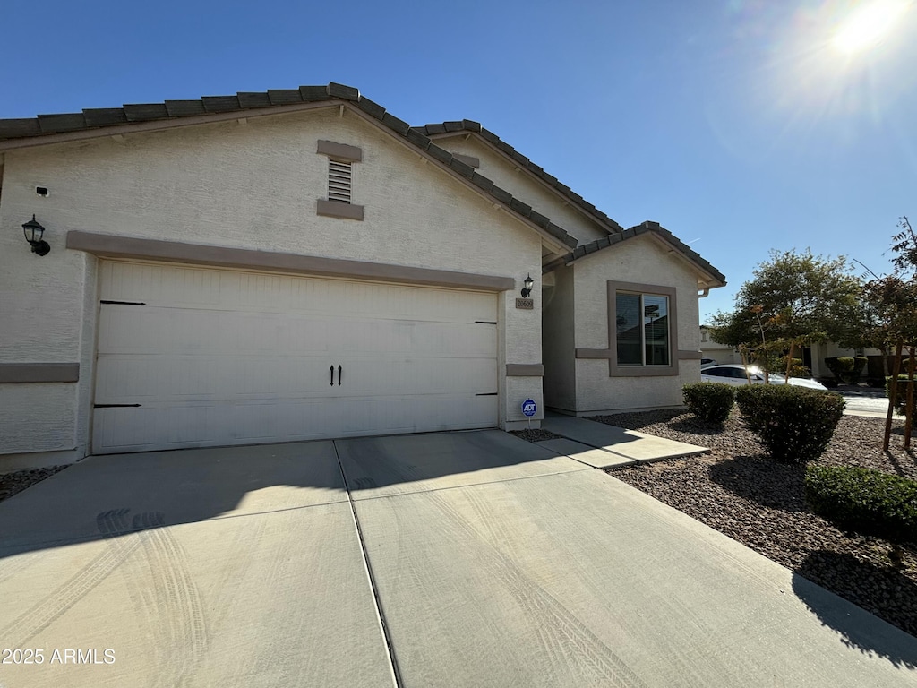 view of front of home with a garage