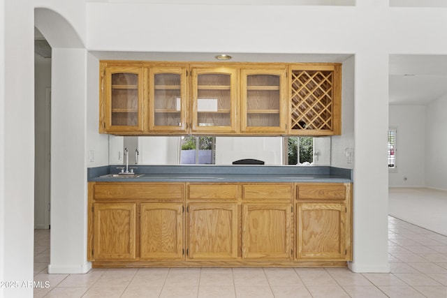 19010 N 35th Way, Phoenix, AZ 85050 - indoor wet bar featuring light tile patterned flooring, baseboards, and arched walkways