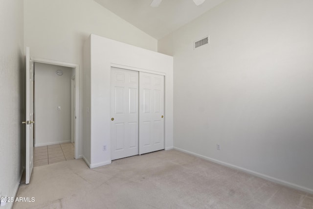 19010 N 35th Way, Phoenix, AZ 85050 - unfurnished bedroom with carpet flooring, high vaulted ceiling, a closet, baseboards, and a ceiling fan