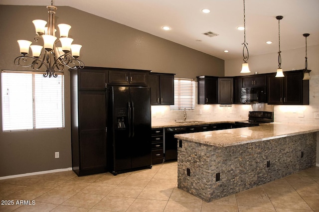 749 N 99th St, Mesa, AZ 85207 - kitchen featuring black appliances, a sink, light stone counters, decorative backsplash, and a peninsula