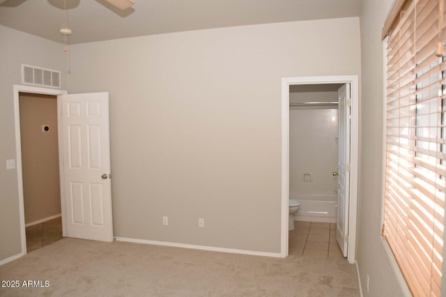 749 N 99th St, Mesa, AZ 85207 - unfurnished bedroom featuring carpet, ensuite bathroom, and baseboards