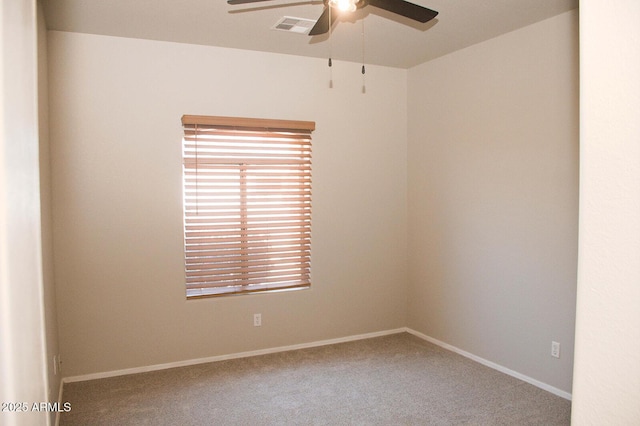 749 N 99th St, Mesa, AZ 85207 - spare room with a ceiling fan, carpet floors, and baseboards