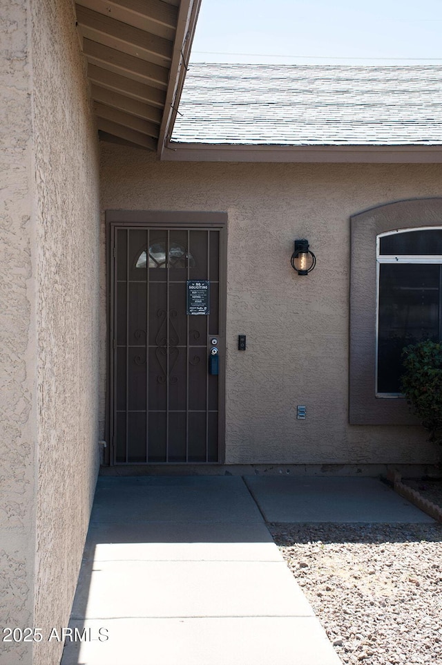 749 N 99th St, Mesa, AZ 85207 - property entrance featuring stucco siding and roof with shingles
