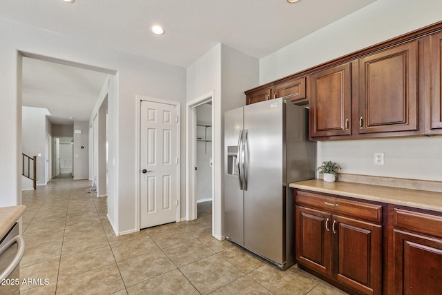 1125 E San Carlos Way, Chandler, AZ 85249 - kitchen featuring appliances with stainless steel finishes, light tile patterned floors, light countertops, and recessed lighting