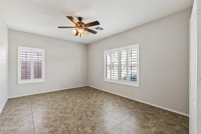 1125 E San Carlos Way, Chandler, AZ 85249 - unfurnished room with plenty of natural light, ceiling fan, and tile patterned floors