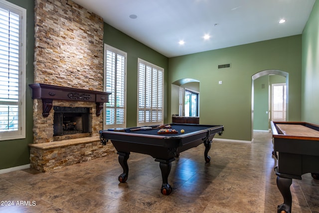 recreation room with a fireplace, plenty of natural light, and billiards