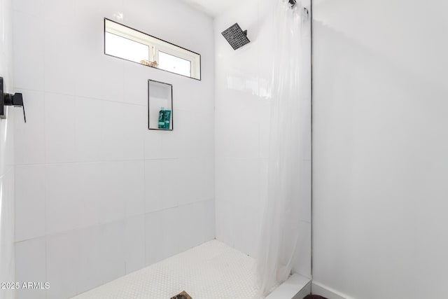 bathroom featuring walk in shower