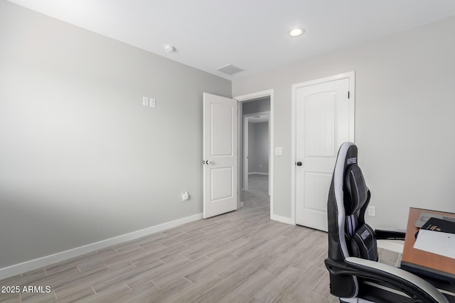 office space featuring light wood-type flooring