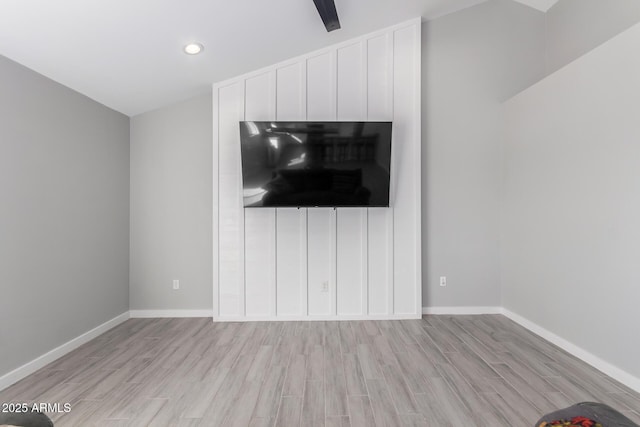 unfurnished living room with light hardwood / wood-style flooring