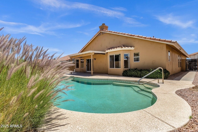 view of pool with a patio, fence, and a fenced in pool