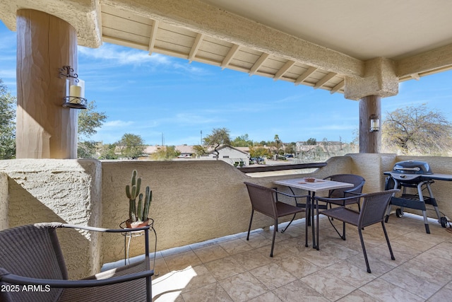 balcony featuring outdoor dining space