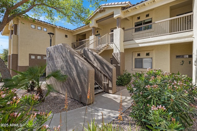 view of community featuring stairway