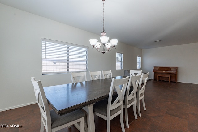 dining area with a chandelier