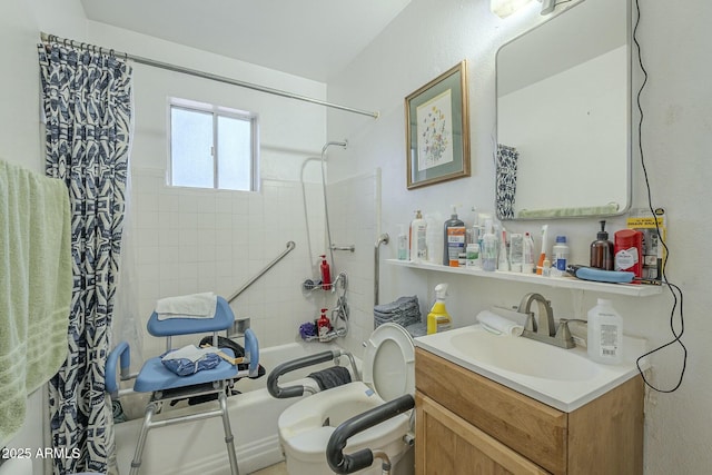 full bath featuring toilet, shower / tub combo with curtain, and vanity