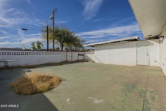 view of yard with a patio and fence