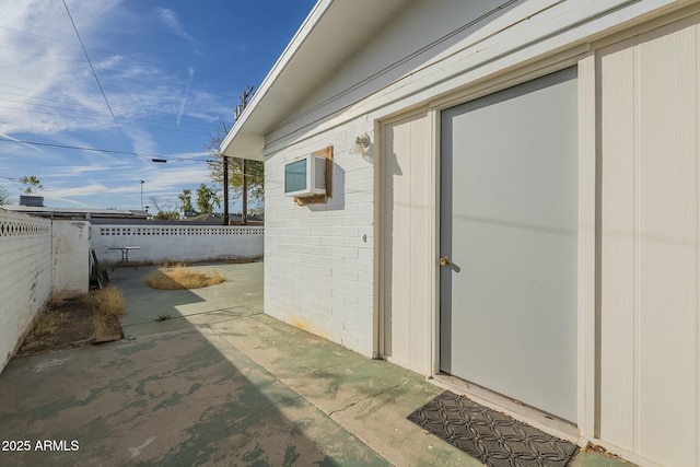 exterior space with a patio and fence