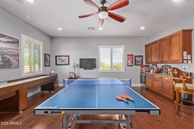 game room with dark wood finished floors, a ceiling fan, visible vents, and recessed lighting
