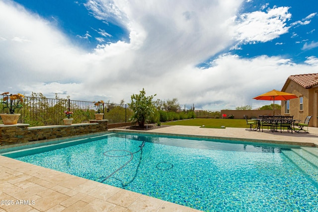 view of pool featuring a fenced in pool, a patio, and fence