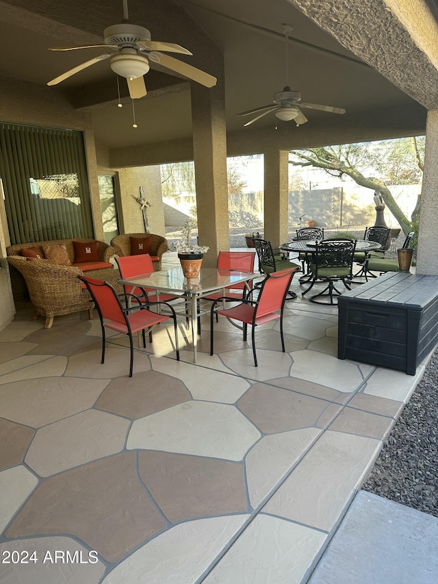 view of patio / terrace with an outdoor living space and ceiling fan