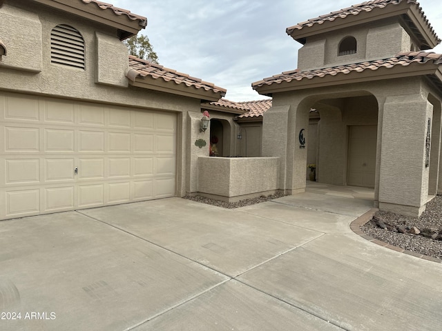 exterior space featuring a garage