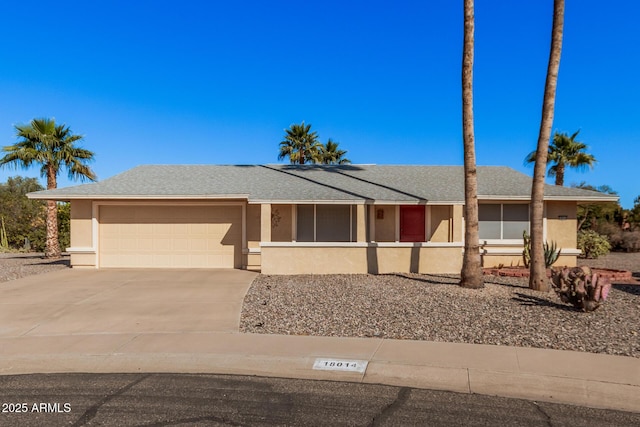 single story home featuring a garage