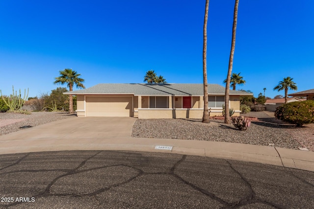 ranch-style home with a garage