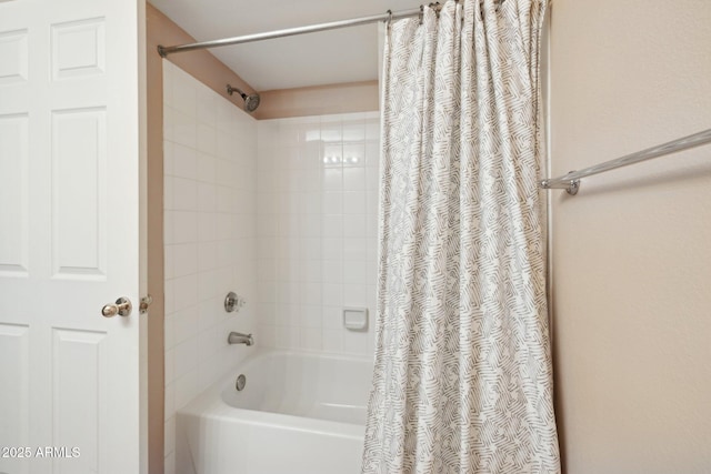full bathroom featuring shower / bath combination with curtain