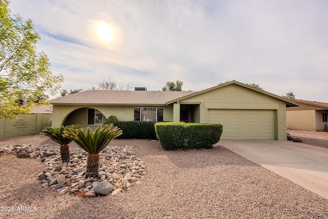 single story home featuring a garage