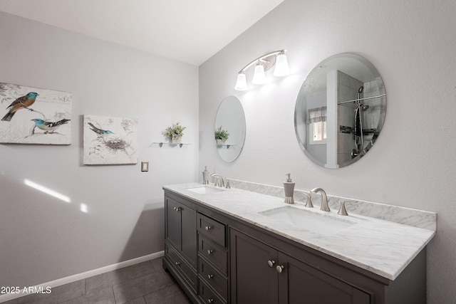 bathroom with vanity and tile patterned floors