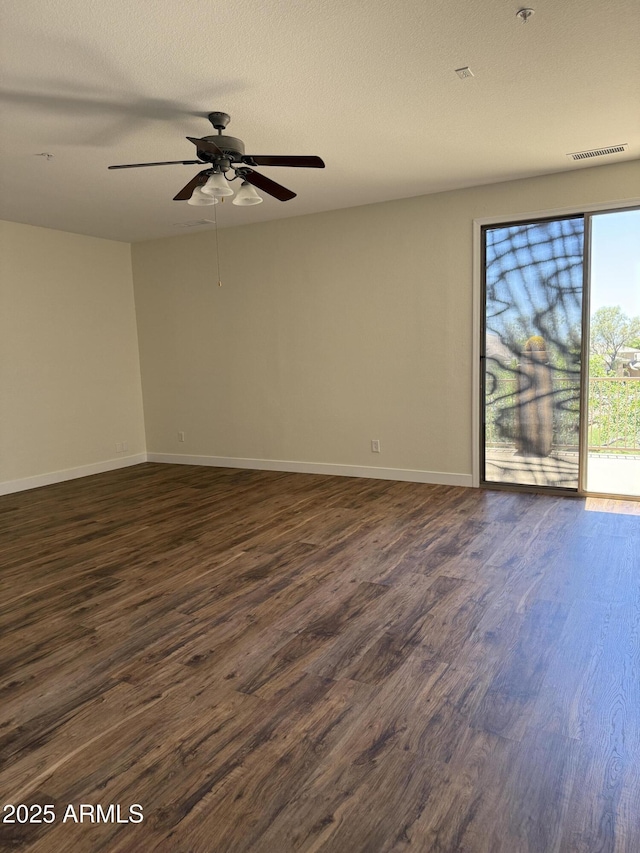 33220 N 60th Way, Scottsdale, AZ 85266 - unfurnished room with dark wood-type flooring and ceiling fan