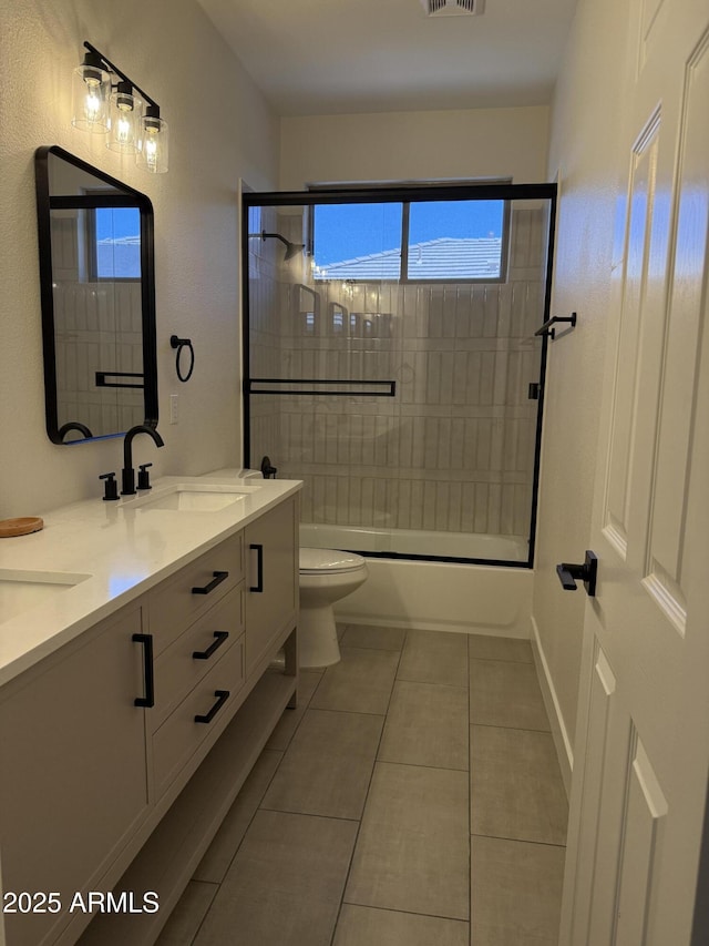 33220 N 60th Way, Scottsdale, AZ 85266 - full bathroom featuring double vanity, tile patterned flooring, and combined bath / shower with glass door