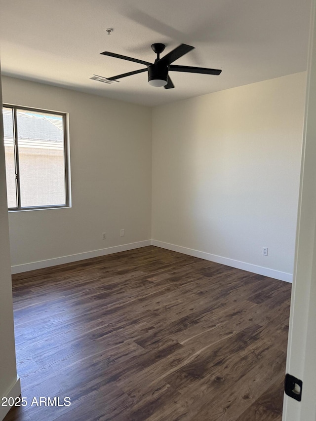 33220 N 60th Way, Scottsdale, AZ 85266 - spare room featuring ceiling fan, dark wood-type flooring, and fire sprinkler in ceiling