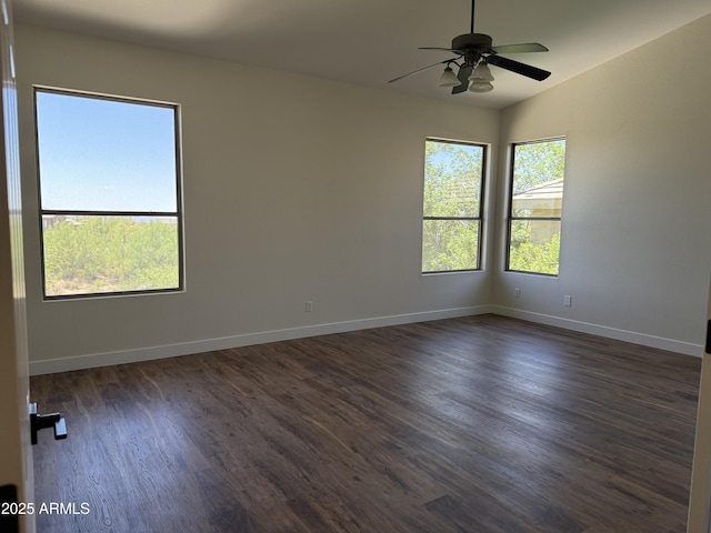 33220 N 60th Way, Scottsdale, AZ 85266 - spare room featuring dark wood-type flooring, ceiling fan, and lofted ceiling