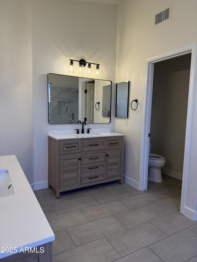 33220 N 60th Way, Scottsdale, AZ 85266 - full bathroom with vanity, a stall shower, and tile patterned flooring