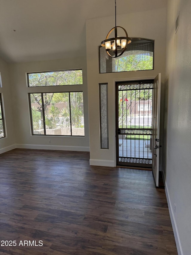 33220 N 60th Way, Scottsdale, AZ 85266 - foyer with a chandelier, healthy amount of natural light, and dark wood finished floors